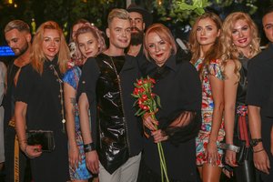 Plaukų stilistai Karolis Murauskas ir Rūta Zenkovienė pristatė drabužių kolekciją grožio meistrams