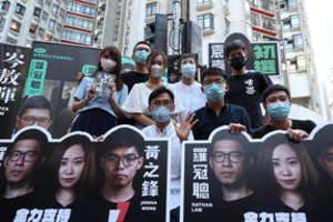 Honkongo demokratai surengė pirminius rinkimus, nepaisydami perspėjimo dėl saugumo