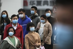 Kinijos sėkmė valdant koronavirusą – ne griežto karantino nuopelnas: prabilo apie eksperimentą