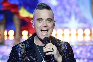 Robbie Williamsas maudosi turtuose: paaiškėjo, kiek uždirbo per metus