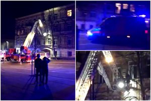 Vilniaus daugiabutyje kilo gaisras – moterį teko evakuoti pasinaudojus kopėčiomis