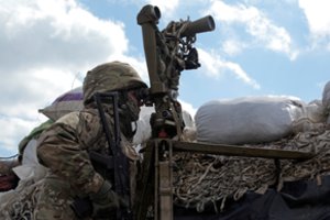 Rusija praneša apie pasiektą tikslą ir karių atitraukimą nuo sienos su Ukraina
