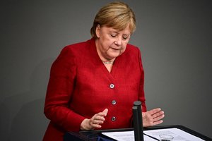 A. Merkel atsiribojo nuo savo tikėtino įpėdinio O. Scholzo