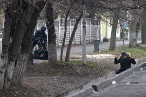Kazachstane per neramumus suimta beveik 6 tūkst. žmonių, žuvo bent 164 žmonės