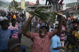 Haitis dėl įsibėgėjančios ekonomikos krizės atideda mokslo metų pradžią