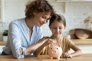 Kaip su vaikais kalbėti apie pinigus?
