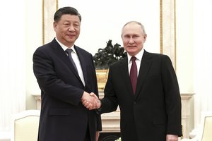 Xi Jinpingas pareiškė įsitikinimą, kad V. Putinas laimės kitus rinkimus