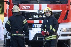 Vilniuje gausios ugniagesių pajėgos gesino klube kilusį gaisrą
