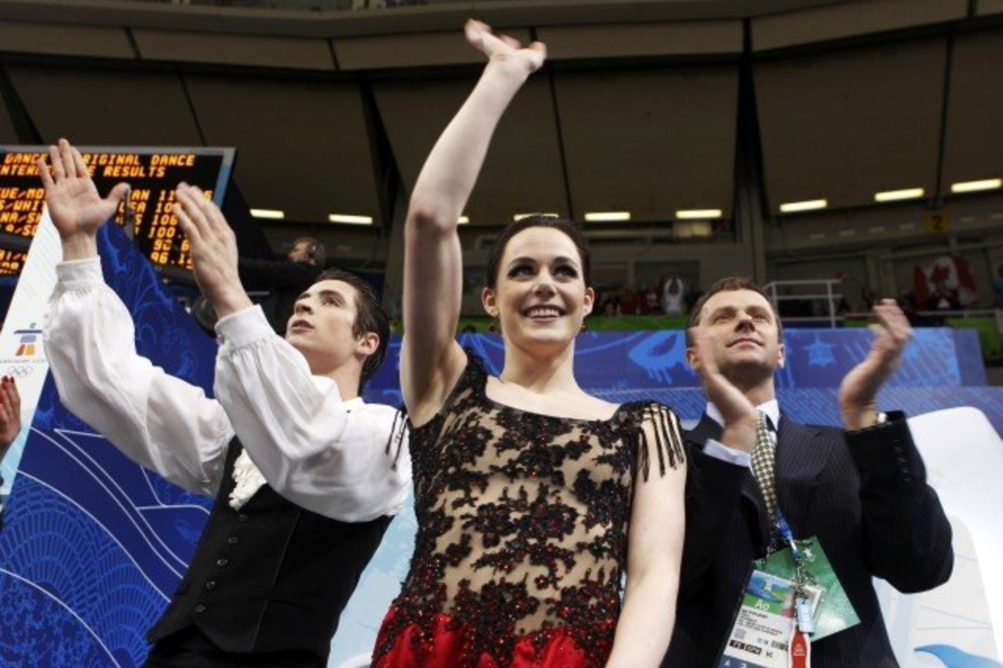Olimpiadoje pirmauja kanadiečiai S.Moiras ir T.Virtue, kuriuos treniruoja I.Špilbandas (dešinėje). Jis yra ir K.Copely bei D.Stagniūno treneris.