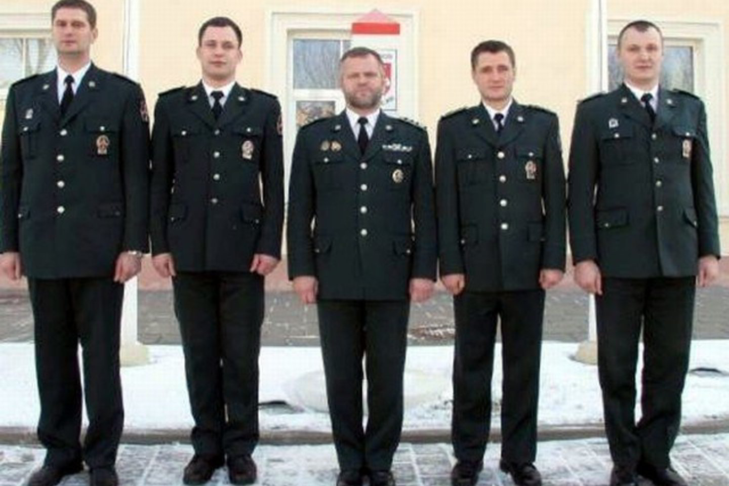 VSAT vadas V.Butinas (viduryje) ir apdovanotieji.