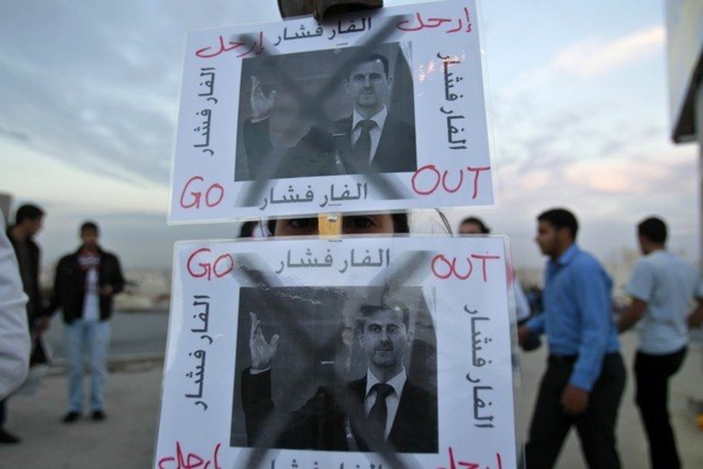 Protestuotojai nepatenkinti Sirijos vadovu Basharu al-Assadu.