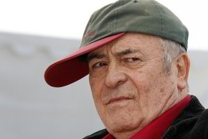 Už gyvenimo kūrybą Auksinę palmės šakelę gavęs režisierius B.Bertolucci skiria ją kovai su S.Berlusconi