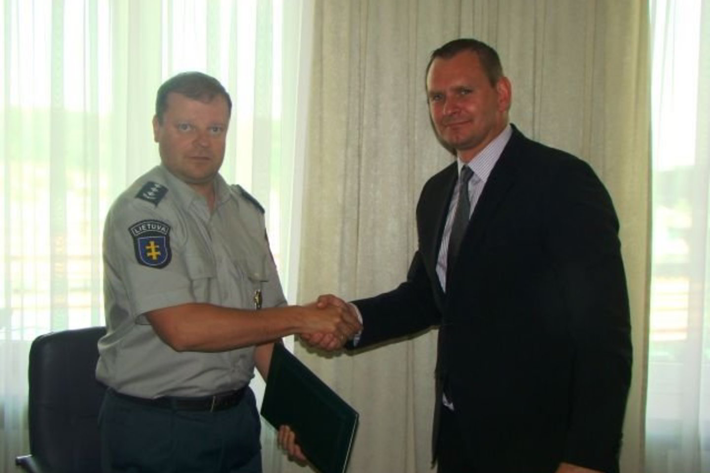 „EuroBasket 2011“ organizacinis komiteto direktorius M.Špokas (dešinėje) susitiko su Policijos generalinis komisaru S.Skverneliu.