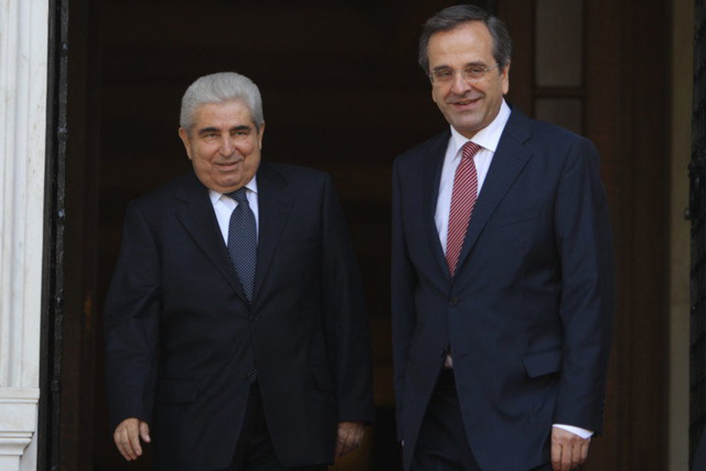 Kipro prezidentas Dimitris Cristofias (kairėje). Gali būti, kad greit jo vadovaujama šalis prašys didelės paramos.