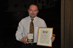 Dirigentui A.Pečiuliui – austrų medalis už šimtametės tradicijos saugojimą