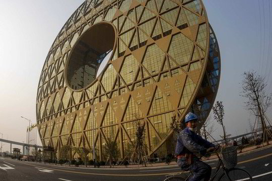 Senovinę monetą primenantis pastatas piktina Kinijos gyventojus