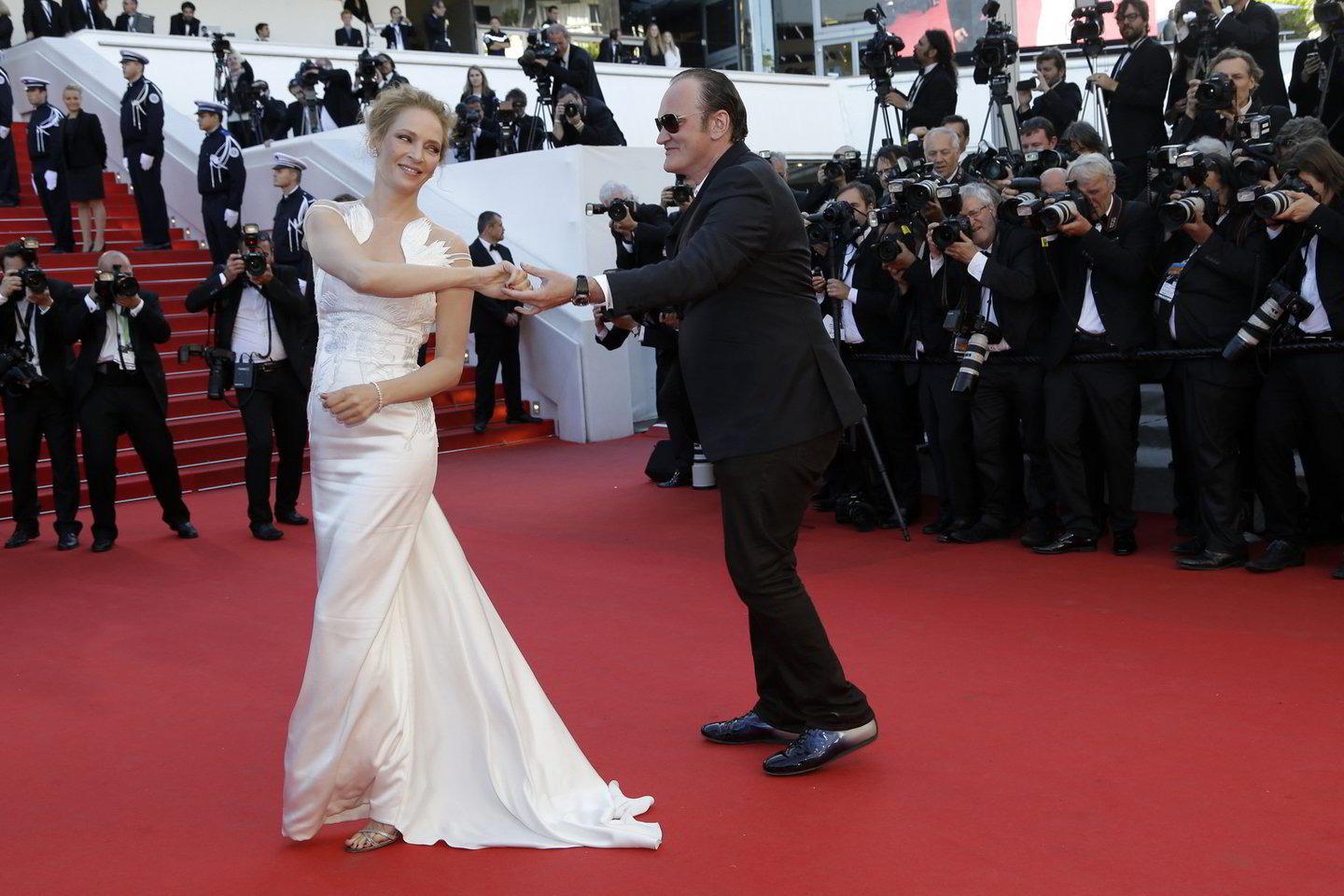 Uma Thurman šėlo su kolega Quentinu Tarantino.<br>AP nuotr.