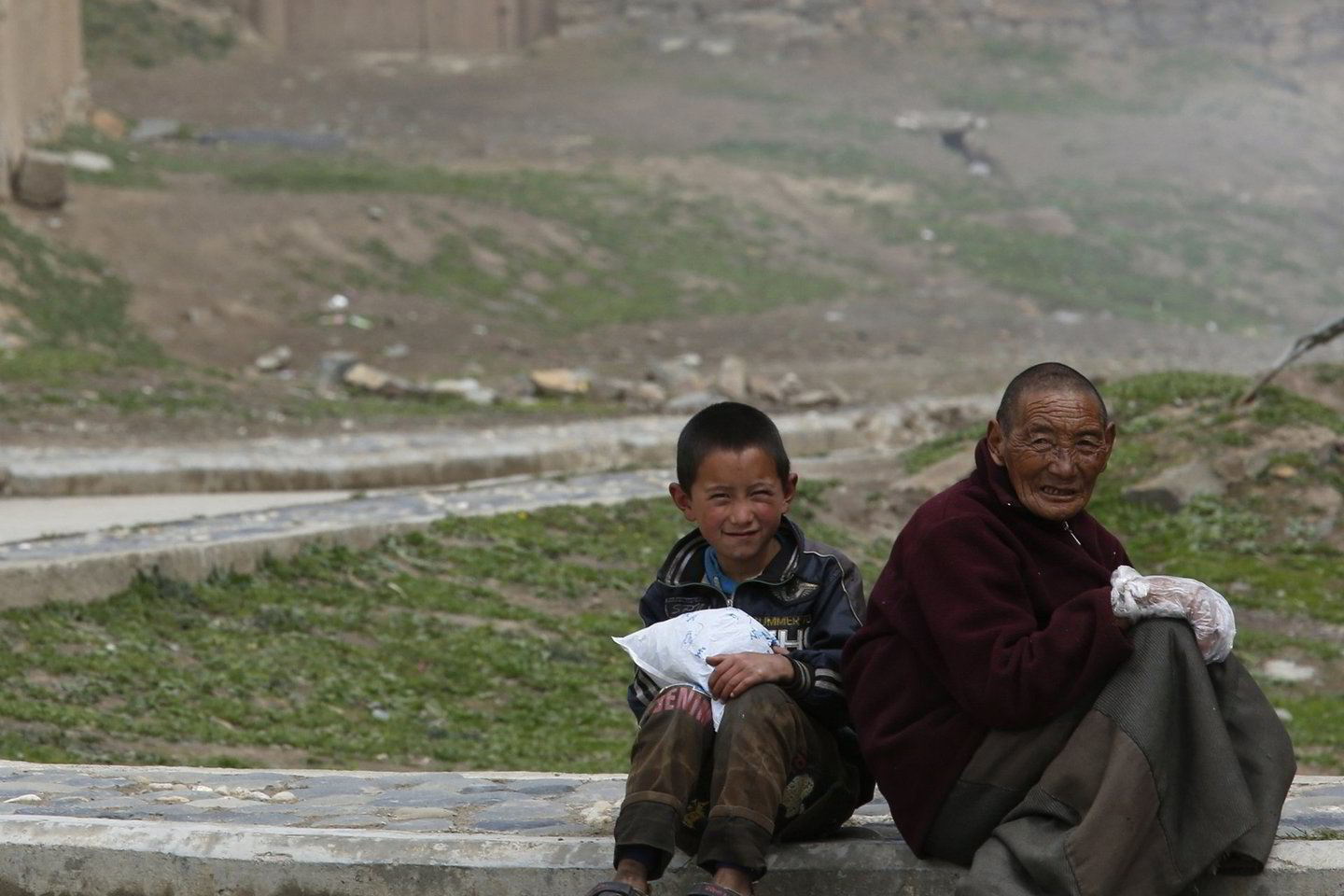 Tibetietiečiai - berniukas ir senelis.<br>Reuters