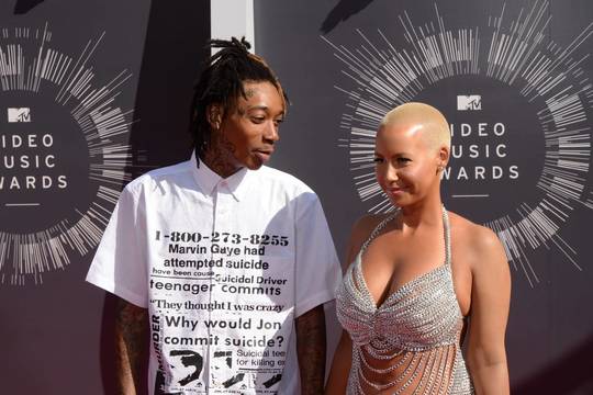 Modelis Amber Rose skiriasi su reperiu Wizu Khalifa