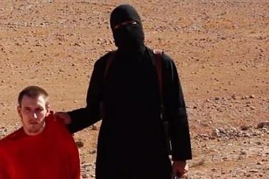 Britui galvą nupjovę islamistai pristatė kitą auką – amerikietį