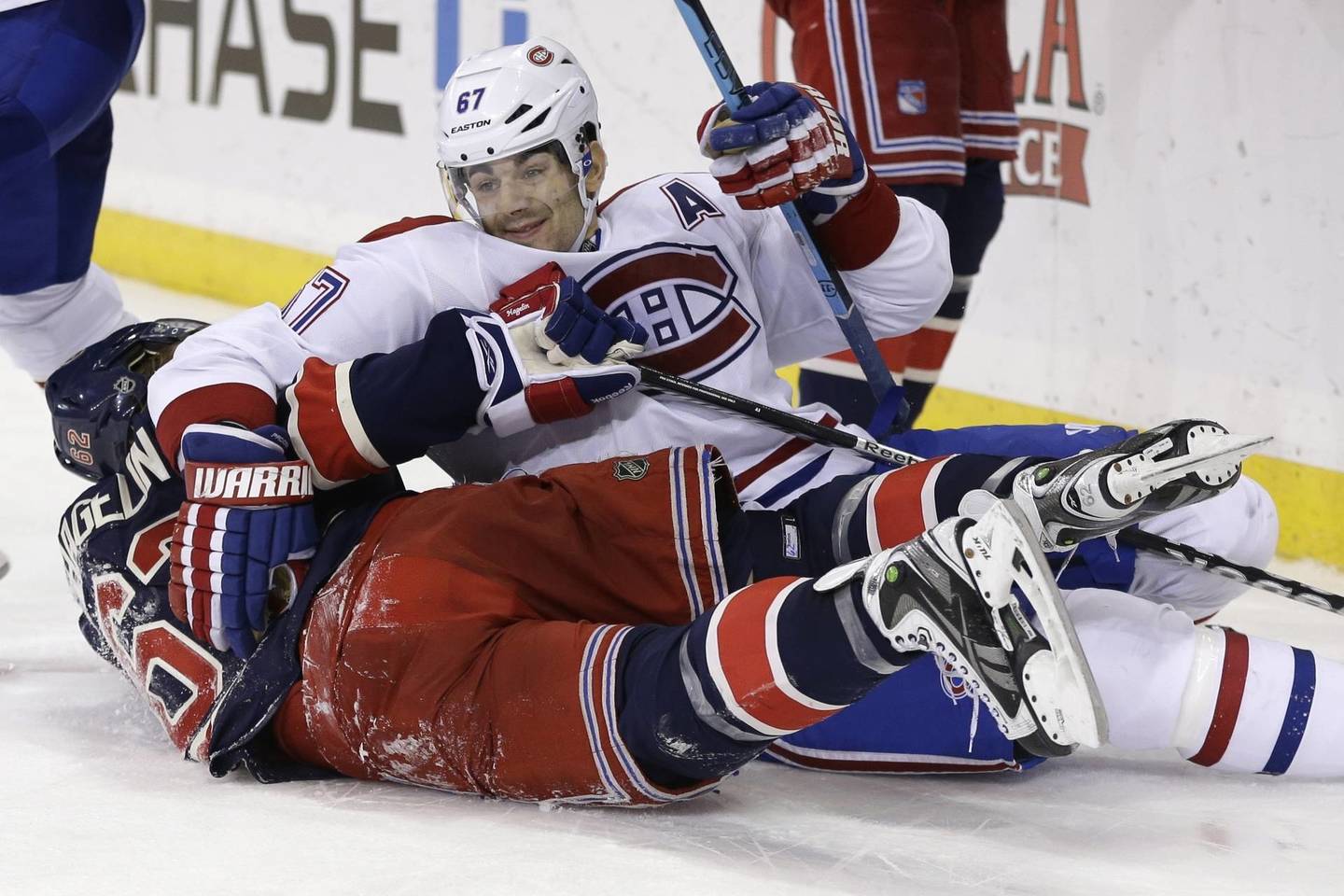 „Canadiens“ - „Rangers“ mačo akimirka.<br>AP nuotr.