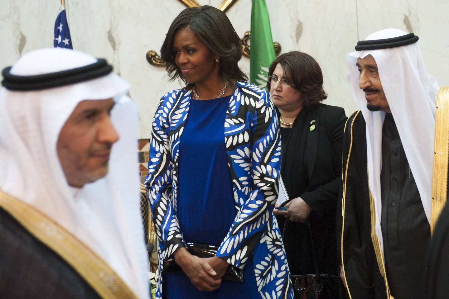 Michele Obama vizito metu savo galvos nebuvo pridengusi jokiu apdangalu.<br>Reuters nuotr.