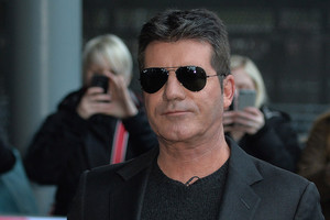 Simonas Cowellas susmuko „užhipnotizuotas“ šuns