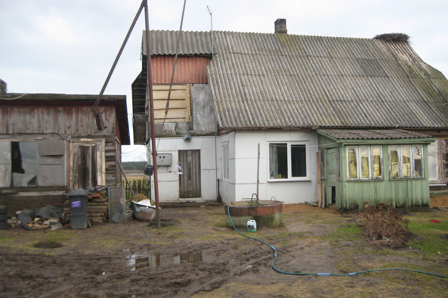 Trijų vaikų motina 2014-ųjų vasarį buvo nužudyta šioje Brastos kaimo sodyboje.<br>L.Juodzevičienės nuotr.