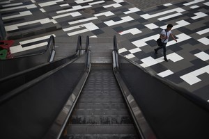 Kinijoje moters gyvybę pasiglemžė eskalatorius