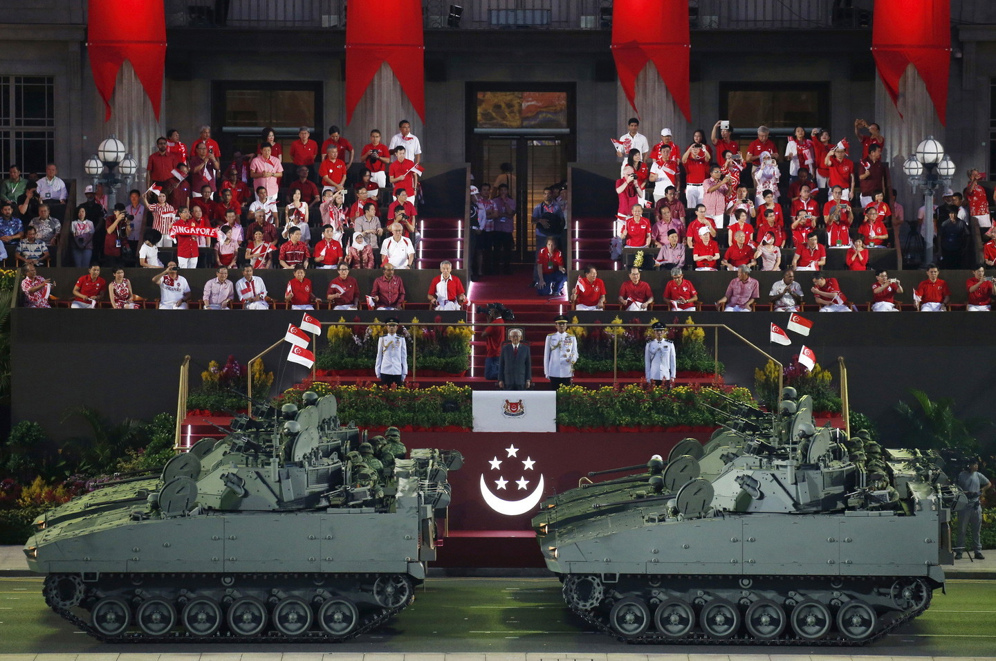 Singapūro gyventojai švenčia šalies pusės amžiaus jubiliejų.<br>Reuters/Scanpix nuotr.