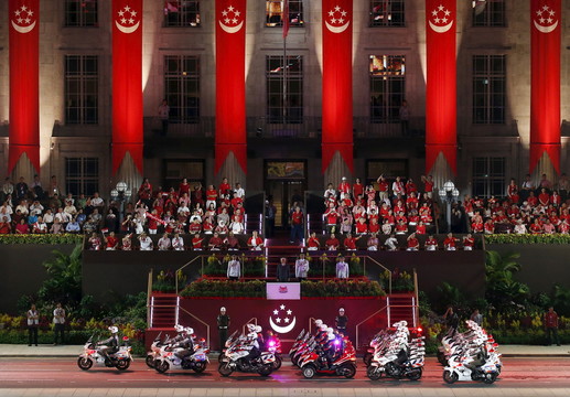 Singapūro gyventojai švenčia šalies pusės amžiaus jubiliejų.<br>Reuters/Scanpix nuotr.