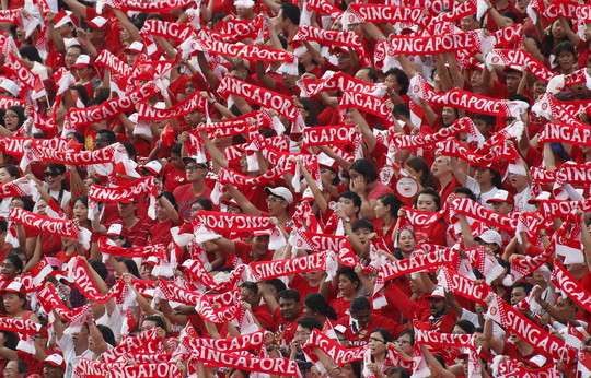 Singapūro gyventojai švenčia šalies pusės amžiaus jubiliejų.<br>Reuters/Scanpix nuotr.