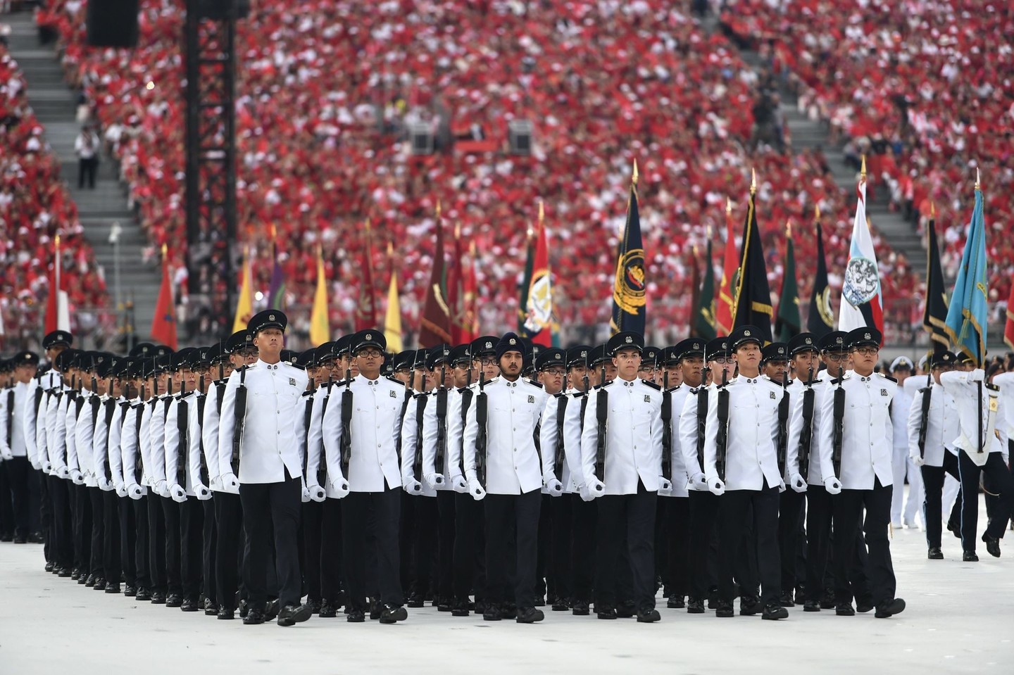 Singapūro gyventojai švenčia šalies pusės amžiaus jubiliejų.<br>AFP/Scanpix nuotr.
