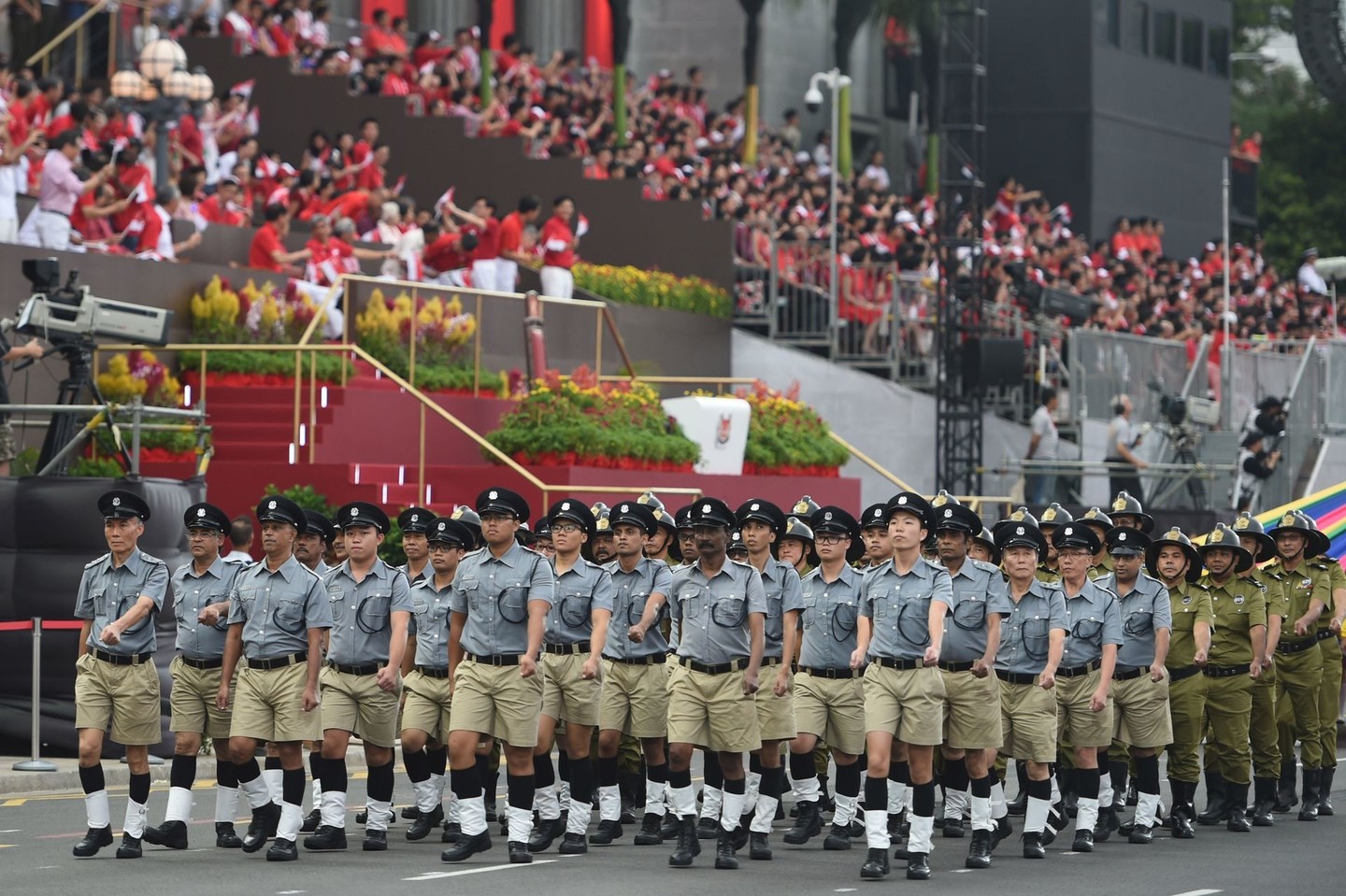 Singapūro gyventojai švenčia šalies pusės amžiaus jubiliejų.<br>Reuters/Scanpix nuotr.