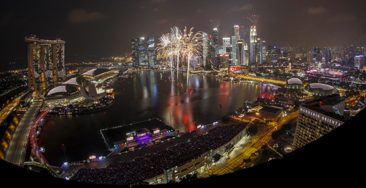 Singapūro gyventojai švenčia šalies pusės amžiaus jubiliejų.<br>Reuters/Scanpix nuotr.