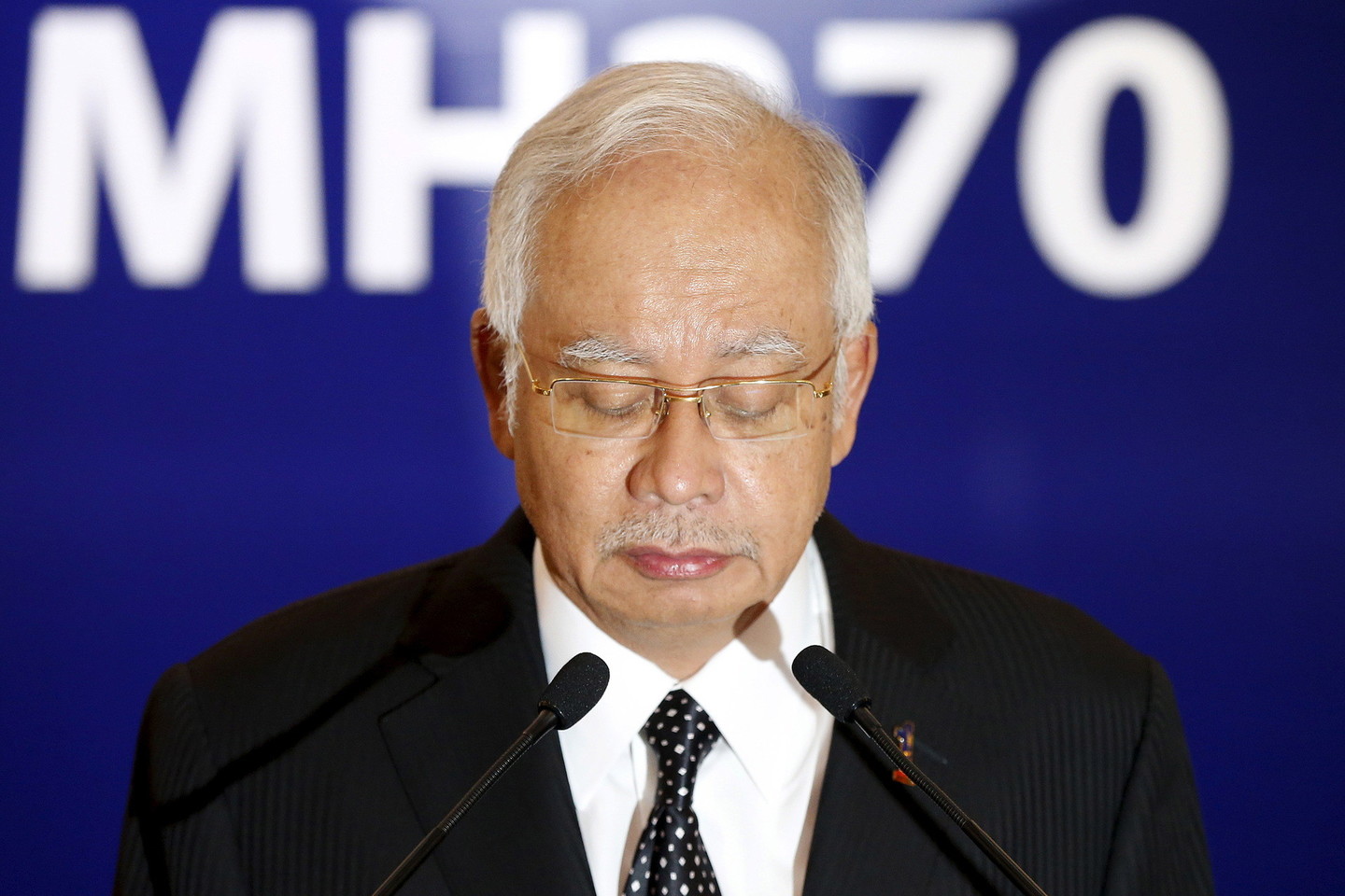 Premjero N.Razako vyriausybės prieštaringi pranešimai apie nuolaužas, priklausančias „Malaysia Airlines“ reiso MH370 lėktuvui sukėlė įtarimų<br>„Reuters“/“Scanpix“ nuotr.