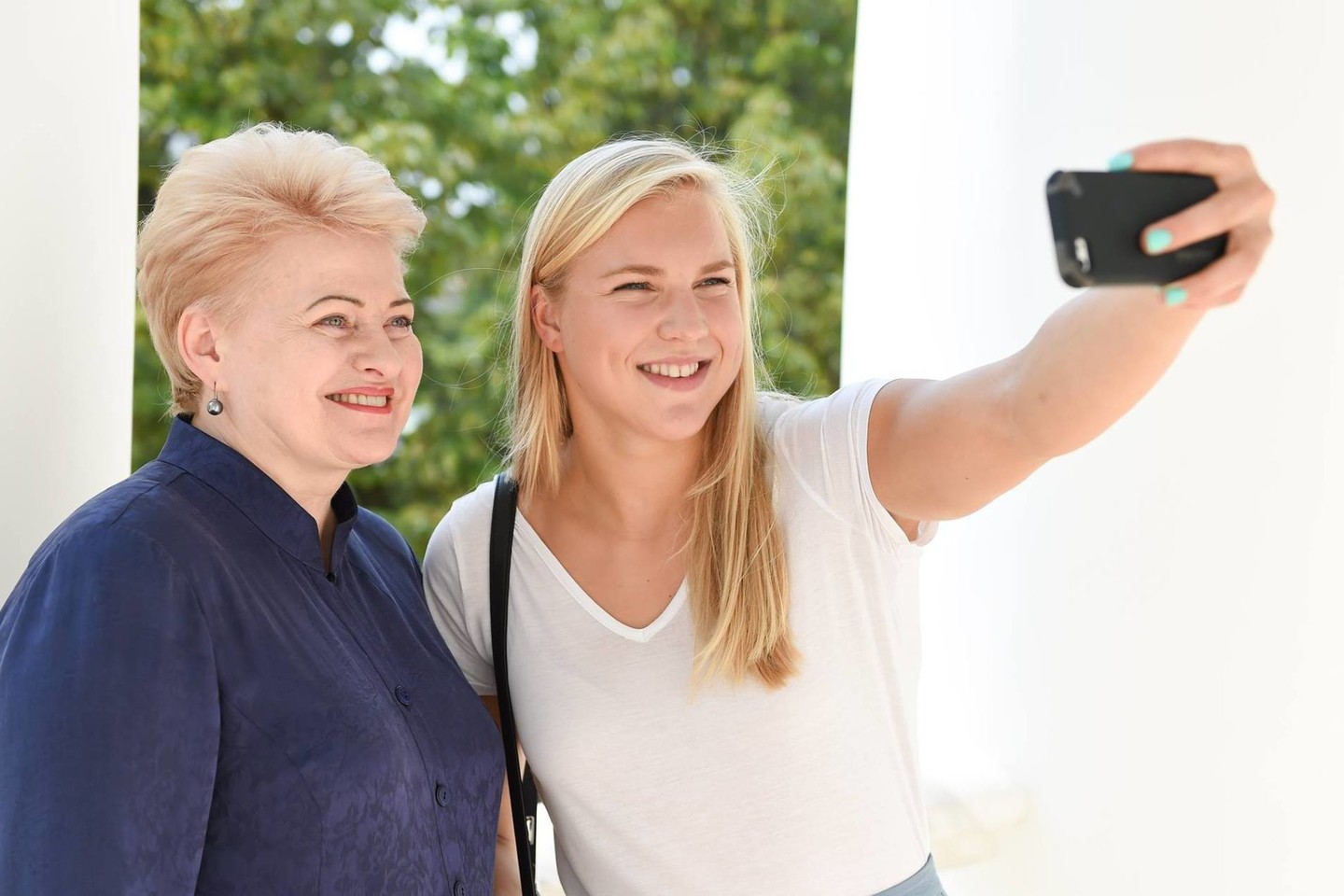 Prezidentė Dalia Grybauskaitė asmenukėje – kartu su plaukike Rūta Meilutyte.