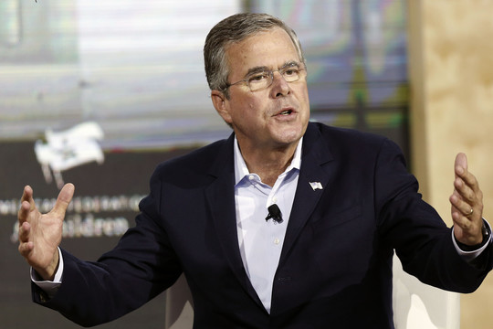 G.Bushas prašo aukoti prezidento posto siekiančiam jo broliui