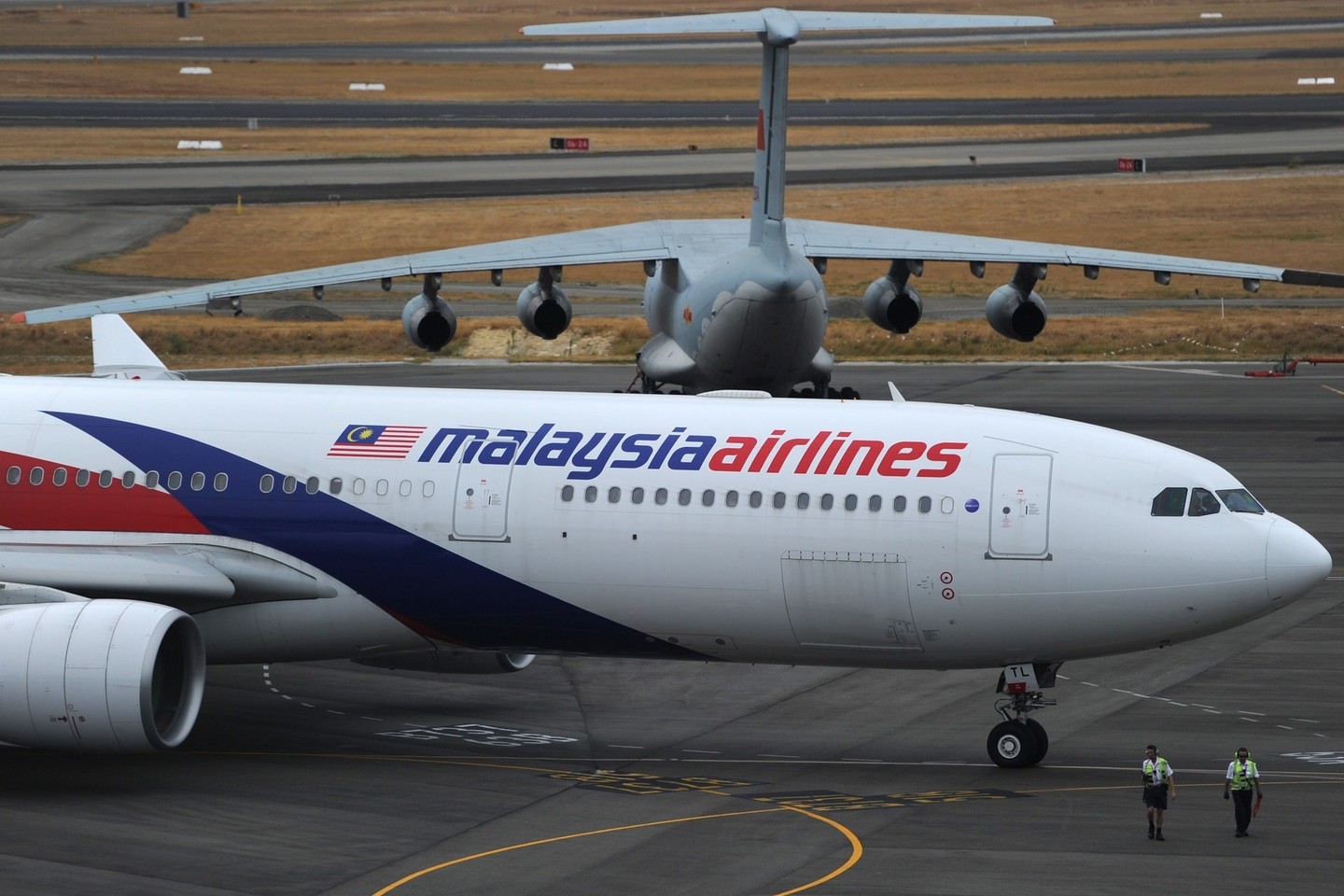 Tiria oro bendrovės „Malaysia Airlines“ vieno iš skrydžių katastrofos priežastis<br>AFP nuotr.