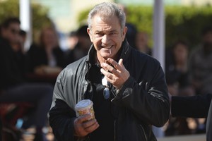 Melas Gibsonas išvengė kaltinimų dėl konflikto su fotografe