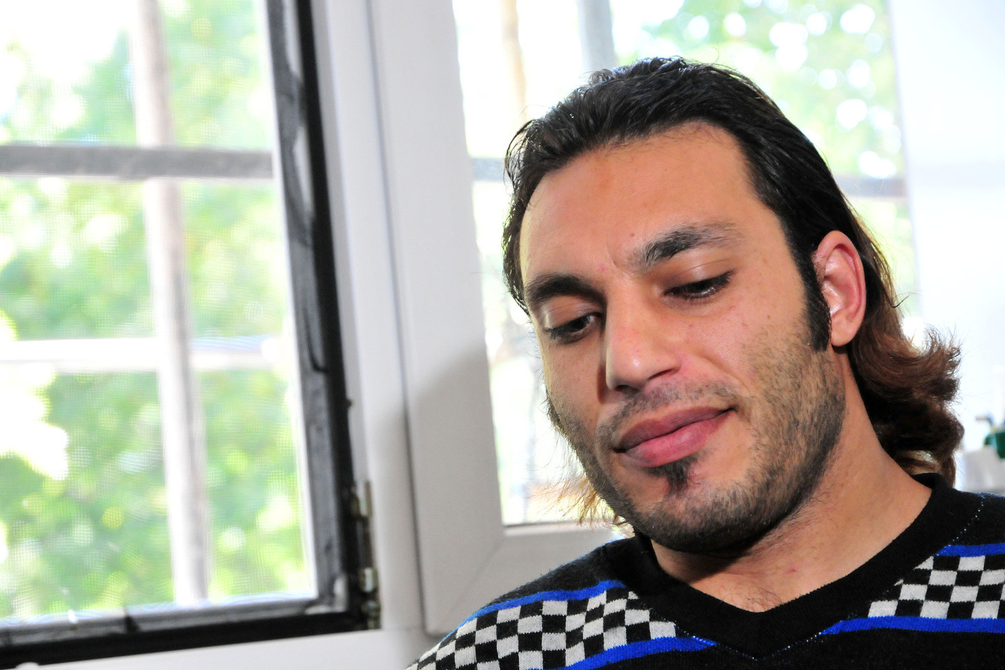 Neįgaliojo vežimėlyje iš Sirijos keliavęs Zaheras Alsakka dabar į Vokietiją trokšta atsigabenti ir savo šeimą.<br>A.Vaitkevičiaus nuotr.
