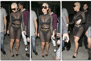 Vulgariai pasipuošusi Amber Rose kulniavo į striptizo klubą