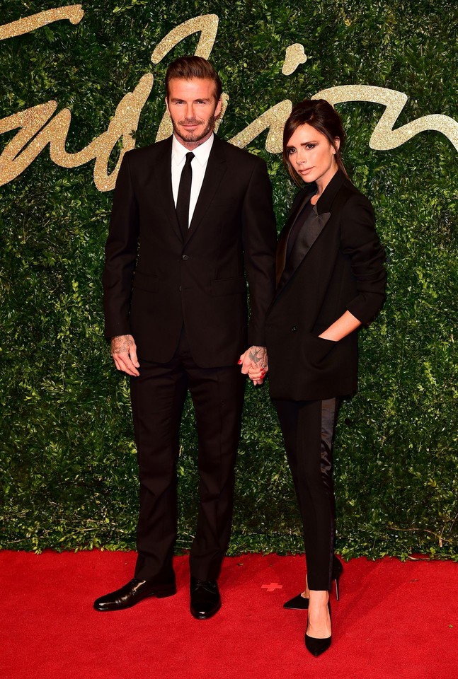 Futbolininkas Davidas Beckhamas su žmona Victoria.