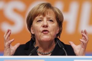 A.Merkel žada riboti migrantų srautą, bet atsisako užverti duris