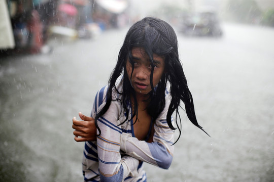 Filipinų sostinėje Maniloje siautė taifūnas „Chan-Hom“.<br>AP nuotr.