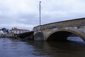 JK potvynių padarytą žalą tvarkyti padėjo Sirijos pabėgėliai