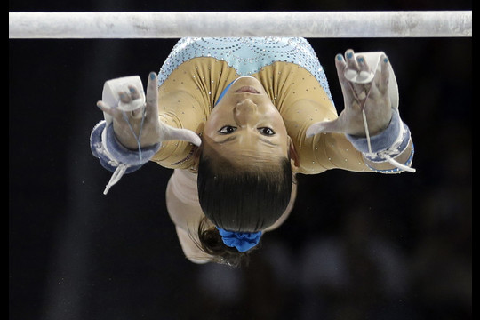Jessica Lopez iš Venesuelos per Toronte vykusias „Pan American“ žaidynes. Meninės gimnastinos varžybose ji iškovojo sidabrą.<br>AP nuotr.