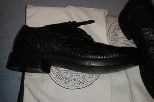 Varanų odos batus atsisiuntęs lietuvis mokės baudą