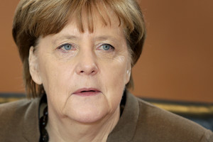 A. Merkel paragino Turkiją sustabdyti nelegalių migrantų srautus