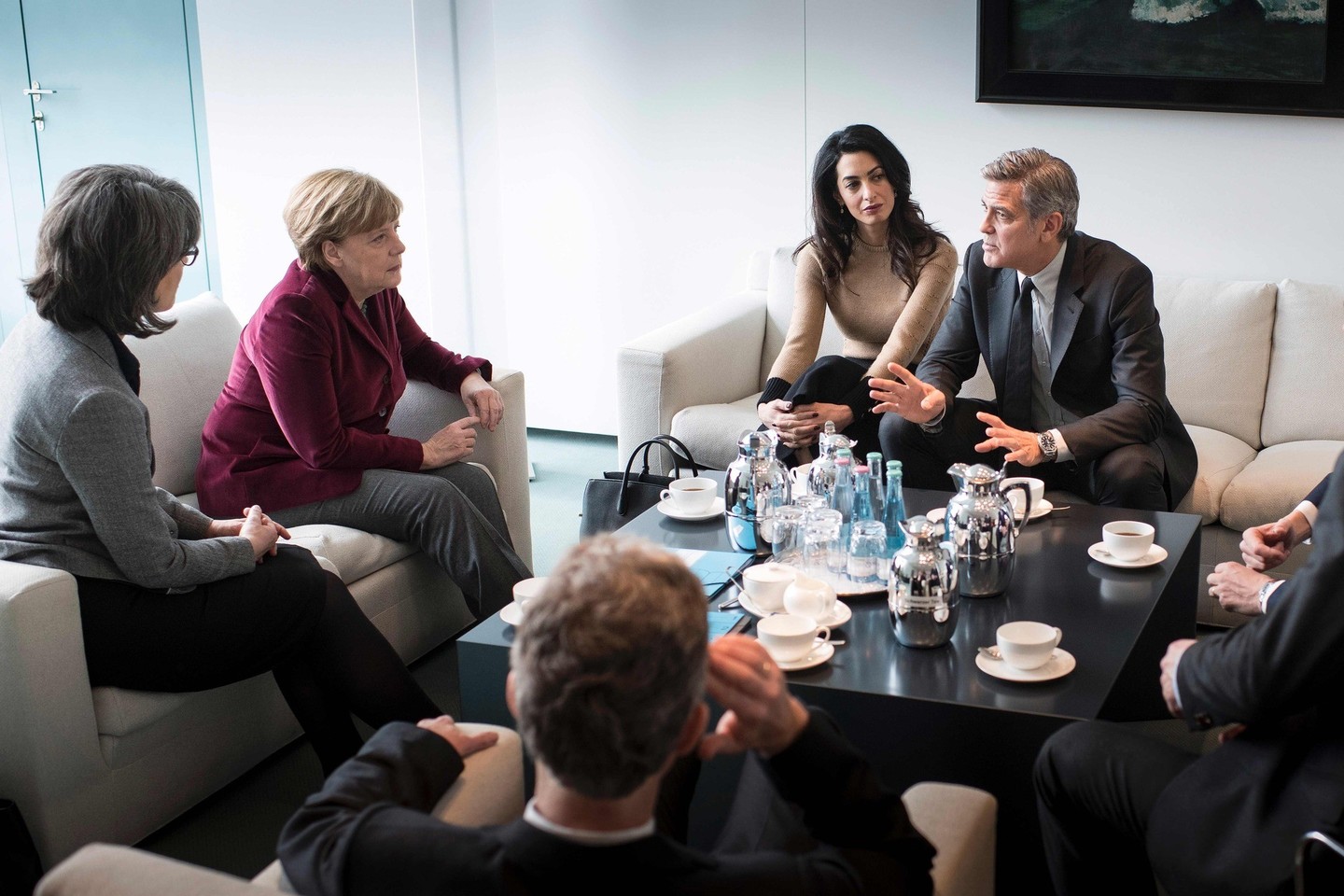 Merkel su Clooney ir jo žmona diskutavo apie pagalbą pabėgėliams.